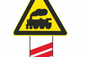 如图所示，这个标志设置在有人看守的铁路道口，提示驾驶人距有人看守的铁路道口的距离还有100米。